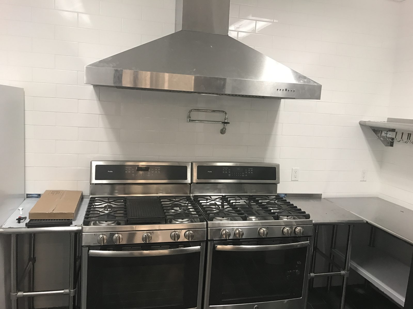Commercial kitchen with dual ranges