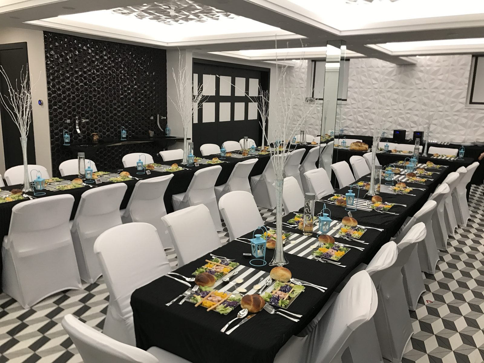 Basement simcha hall set for formal dinner